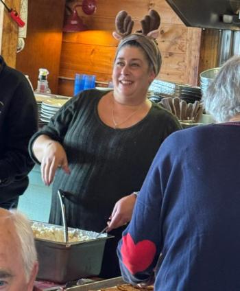 Heather smiles as she sees Santa.