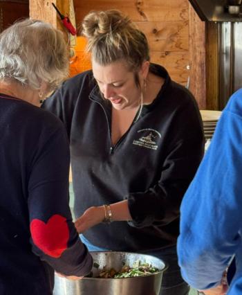 Winter Page serves up the salad.