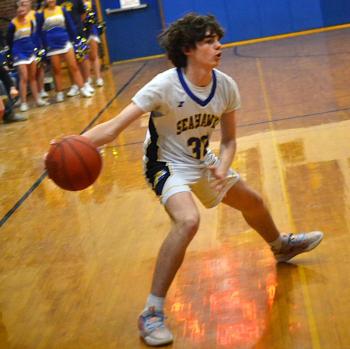 Ethan Clark looks to either drive or pass in the first half. KEVIN BURNHAM/Boothbay Register