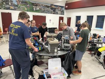 The alliance perform maintenance and inspections while discussing strategy in the elimination round. Courtesy photo