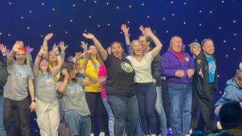 Emily Mirabile and Sophia Mansfield perform onstage with other teachers and directors at the Awards Ceremony.  Courtesy of Emily Mirabile     