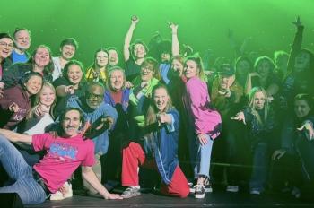 Emily Mirabile and Sophia Mansfield pose with Mary-Catherine of itheatrics and other festival directors on the main stage during rehearsal.  Courtesy of Emily Mirabile