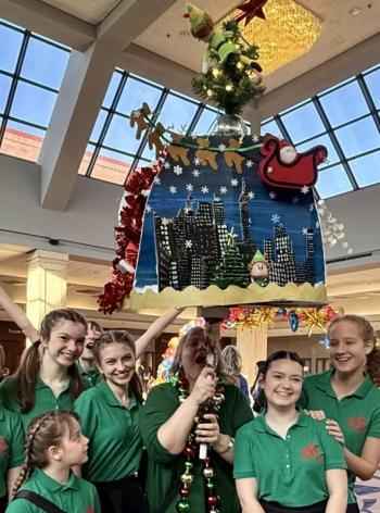Lucie Hollon, Sloan Nelson, Jessie Ullo, Kyleigh Cole, Lina Minzner and Isla Sullivan pose with Brianne Martin and her spirit stick!  Emily Mirabile photo