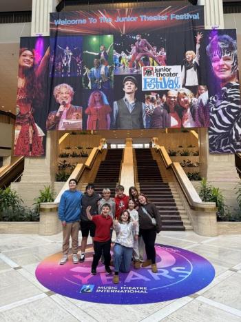 Jessie Ullo , Oscar Mirabile, Violet Baldwin, Agatha Harris and Grace Olcott in front of the festival banner at the Renaissance Waverly Hotel. Emily Mirabile photo