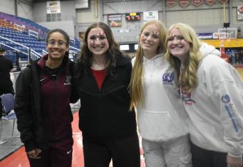 Xavi Hall, far left, with friends  and former Wildcat teammates, Eleanor Erwin, Arabella Hodgdon and Lily Cowan post game in Augusta. LISA KRISTOFF/Boothbay Register
