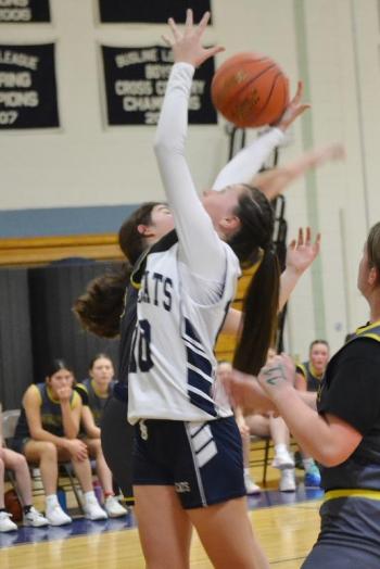 Meabh Hennessy looks to grab a rebound.  KEVIN BURNHAM/Boothbay Register