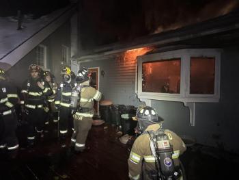 Firefighters work at containing a fire at 2 Maddocks Road in Southport on Monday, Feb. 16. Courtesy of Mark Sullivan