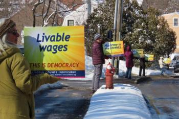 New signs by Lincoln County Indivisible on display this past weekend. Courtesy photo