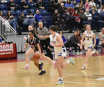 Xavi Hall flanked by Eagles. LISA KRISTOFF/Boothbay Register