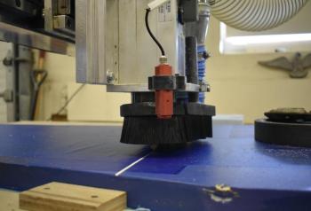 The CNC router at work. ISABELLE CURTIS/Boothbay Register