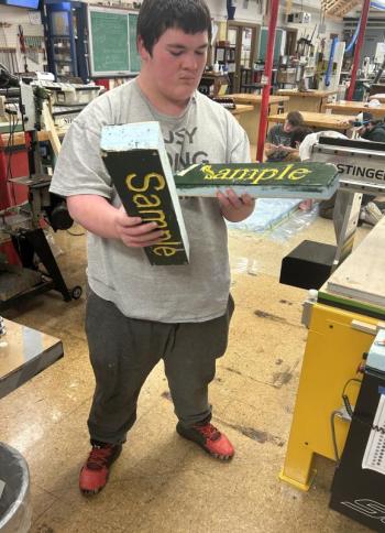 Mathew Jackson inspects some samples and test pieces. Courtesy of Chris Liberti.