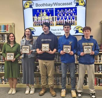 Plaque award winners, from left to right, Rose Campbell (coach's' award), Maggie McCarthy (most improved), Logan Bourne (coach's' award), Ben Gapski (MVP), Isaac Fanslau (most Improved).  Not pictured Moriah Smith (MVP). Courtesy Nick Scott. 