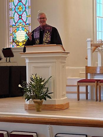 The Reverend Todd Weir preaching from the new dais and behind his new lectern on Palm Sunday, March 29. Courtesy photo