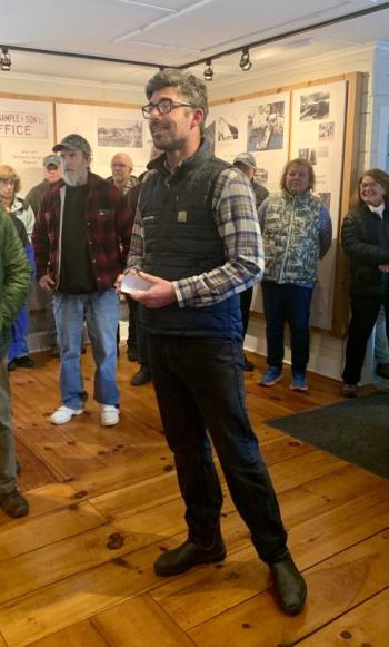 General Manager Dennis Gunderson speaks to a packed open house. ISABELLE CURTIS/Boothbay Register