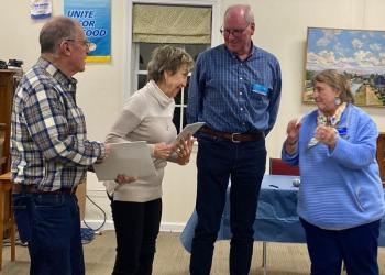 Rotarians Vicki Haugen and Jeff Long welcome new members Loretta Steeves and Bob McKane. Courtesy photo