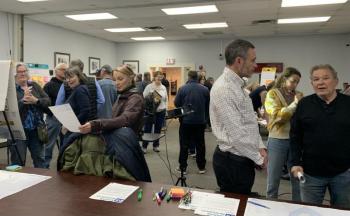 Boothbay Harbor residents gather around different stations to share thoughts on the town's future during a public workshop breakout session. ISABELLE CURTIS/Boothbay Register
