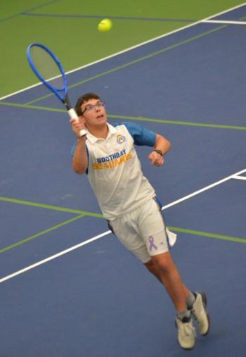 Elijah Smith gets to the ball against Madison in his no. 2 double match. KEVIN BURNHAM/Boothbay Register