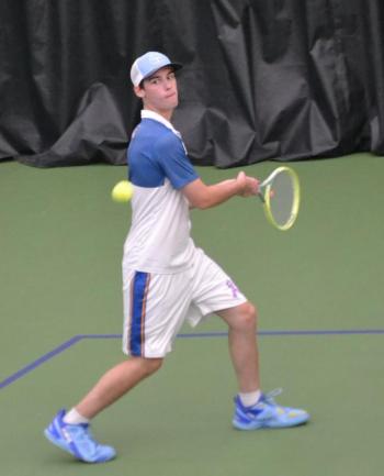 Cole Hyson, playing no. 3 singles, gets a good look at the ball in his match against Madison. KEVIN BURNHAM/Boothbay Register