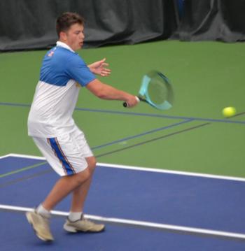 Ronan Drage tracks down the ball during his second doubles match against Madison. KEVIN BURNHAM/Boothbay Register