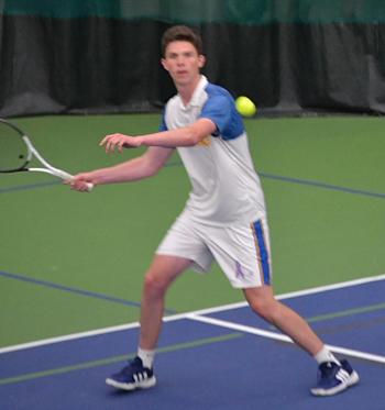 Harry Hinckley, playing first doubles, looks to return the ball. KEVIN BURNHAM/Boothbay Register