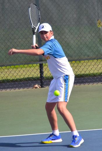 Avery Fowlie, playing second doubles with Elijah Smith, sets to make a return against NYA on May 19. KEVIN BURNHAM/Boothbay Registe