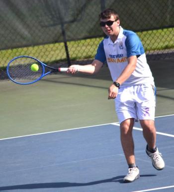 Elijah Smith, playing second doubles with Avery Fowlie, has a good look at the ball for a return against NYA on May 19. KEVIN BURNHAM/Boothbay Register