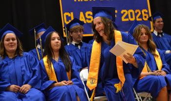 Rose Campbell returns to her seat after receiving one of several awards and scholarships during Awards Night June 10. KEVIN BURNHAM/Boothbay Register