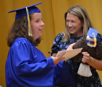 Chloe Joneth receives the BRHS Seahawk Spirit And Citizenship Award from Guidance Counselor Leanne Burnham. KEVIN BURNHAM/Boothbay Register