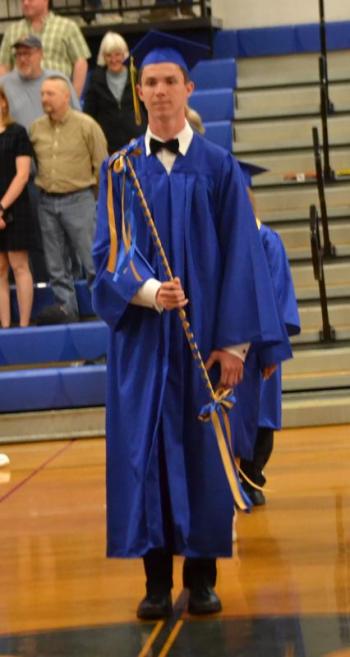 Class Marshal Harry Hinckley leads his classmates through the gym. KEVIN BURNHAM/Boothbay Register