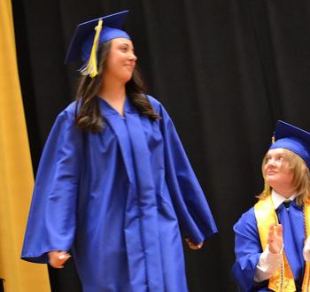 Sophie White heads to the podium to pick up one of her awards. KEVIN BURNHAM/Boothbay Register