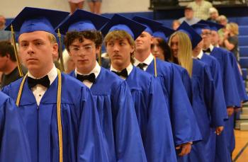 Seniors march through the gym on their way to the stage for Awards Night June 10. KEVIN BURNHAM/Boothbay Register