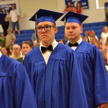 Seniors march through the gym on their way to the stage for Awards Night June 10. KEVIN BURNHAM/Boothbay Register