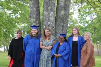 Instructor Tanya Thibault, left, Nevaeh Morin, Director Raye Leonard, Camla Dunbar, Allyson Warren, and Instructor Margit Ahlin celebrated Boothbay-Wiscasset Regional Adult Education’s Boothbay office graduation at Barrett Park on June 6. Anina Halter, not pictured, graduated, as well. Courtesy photo