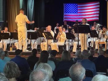 Chief Warrant Officer 2 John Page conducting the band. LISA KRISTOFF/Boothbay Register 