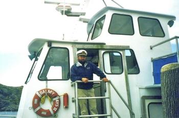 Capt. Mark Colby welcoming passengers aboard the Balmy Days II. Courtesy image