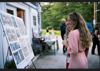 Guests peruse campus designs created by Knickerbocker Group and Carson Douglas Landscape Design. Courtesy of Shannon Parker