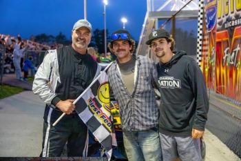 Gregg Norton is joined by his two sons, Owen and Noah, in Victory Lane. Jasen Dickey Photography