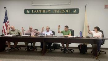 The Boothbay Harbor Planning Board approves the Fuller's shoreland permit during a July 2 meeting. ISABELLE CURTIS/Boothbay Register