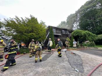 Firefighters at the scene of the fire at 7 Farnham Point Road, East Boothbay, June 30. Mark Sullivan photo
