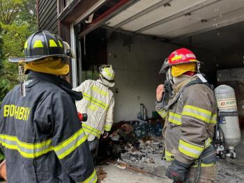 Firefighters at the scene of the fire at 7 Farnham Point Road, East Boothbay, June 30. Mark Sullivan photo