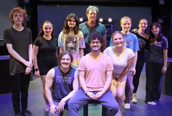 Under the guidance of Niall Lessard, nine cast members form the moving parts of "The Machine" in Heartwood Theater's "The Machine Stops" running July 17-25. Front, left: Roosevelt Bishop, Niall Lessard, Sophia Mansfield; back from left: Tristan Lambert, Rebecca Tomasello, Addison McCafferty, Tim Cunningham, Jay Long, Katelyn Prior, Natalie Friel. Courtesy of Heartwood