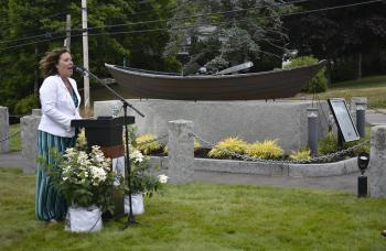 White and Green Hope Founder Liz Michaud opens ceremonies July 21st in Boothbay Harbor for Maine's first state Commercial Fishing Remembrance Day.  ISABELLE CURTIS/Boothbay Register