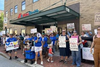 Members of Miles Delivers Action Coalition marched to MaineHealth in Portland to protest the potential closure on Saturday, August 1. Photo by Megan Blonigen