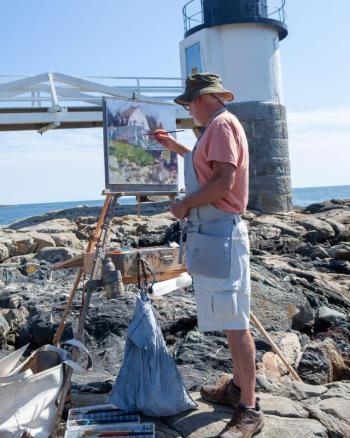 Neal Hughes paints at a favorite location, Marshall Point Lighthouse. Hughes and plein air colleague Crista Pisano will be at Sylvan Gallery during the WAW. Courtesy of Ann Scanlon 