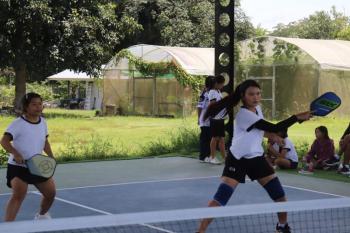 Jun and Pin playing in the Pickleball Stars Tournament. Courtesy of FTD