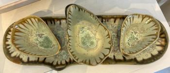 Three dishes of the Oyster design donated by Ae Home.