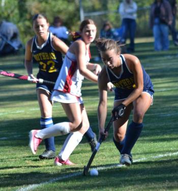 Moriah Smith enters the ball into the scoring D during the first half of Boothbay's home against Lisbon Sept. 23. KEVIN BURNHAM/Boothbay Register