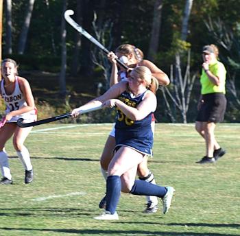 Lilly Cowing and a Lisbon player get tangled up in the second half. KEVIN BURNHAM/Boothbay Register