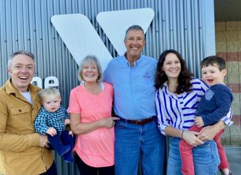Pictured from left are Caleb Easton, Barrett Hodgdon, Cathy Hodgdon, Tim Hodgdon, Audrey Hodgdon, and Grant Hodgdon in front of the Y’s Harbor Montessori School at morning drop-off. Courtesy of Allyson Goodwin 