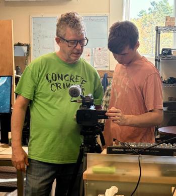 Sheppard and Hyson adjust the camera's white balance in preparation. ISABELLE CURTIS/Boothbay Register